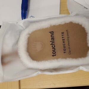 Touchland shearling clip on pouch